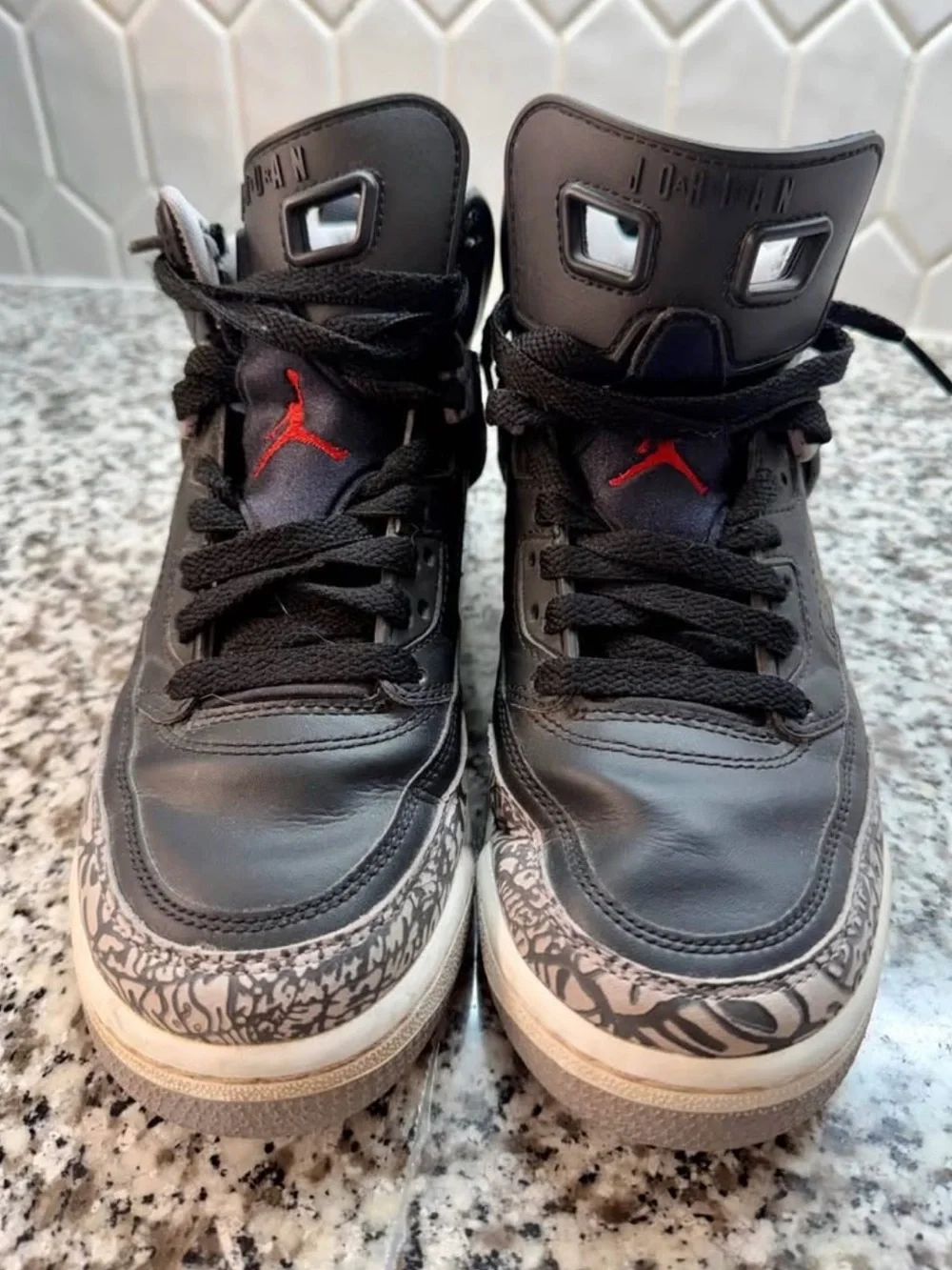 Nike Kids' Black Retro Style High-Top Sneakers with Cement Accents